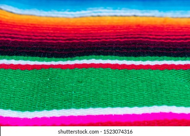 Sarape, Zarape Or Jorongo Is A Men's Garment Worn By The Country Man To Cover Himself From The Rain And Cold, Is A Mexican Outfit From The City Of Saltillo. It Serves Like Shelter, Blanket, Or Rug.