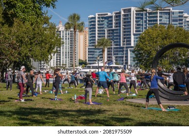 Sarasota, FL, US-November 27, 2021: Large Outdoor Yoga Class In Bayfront Park Near Marina And Water.