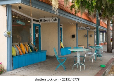 Sarasota, FL, US-October 1, 2022:  Street Scene In Historic Downtown District With Small Local Restaurant In Background.