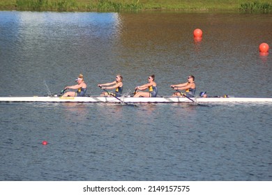 Sarasota, Florida United States - April 15 2022: University Of Michigan Rowing Crew Team Big 10 Ten Invitational Competition At Nathan Benderson Park Varsity 4 Person Row Boat Womens Big Ten Rowing