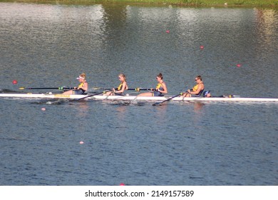 Sarasota, Florida United States - April 15 2022: University Of Michigan Rowing Crew Team Big 10 Ten Invitational Competition At Nathan Benderson Park Varsity 4 Person Row Boat Womens Big Ten Rowing