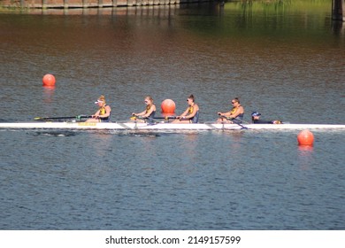 Sarasota, Florida United States - April 15 2022: University Of Michigan Rowing Crew Team Big 10 Ten Invitational Competition At Nathan Benderson Park Varsity 4 Person Row Boat Womens Big Ten Rowing