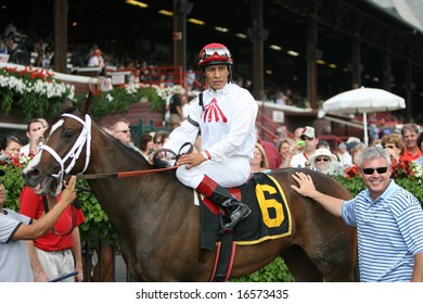 SARATOGA SPRINGS - August 17: Edgar Prado Aboard Anjorie In The Winners Circle After The Fifth Race August 17, 2008 In Saratoga Springs, NY.