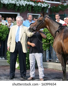 SARATOGA SPRINGS - August 18: Country Star With Owner In The Winners Circle After Winning The Sixth Race August 18, 2008 In Saratoga Springs, NY.