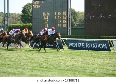 SARATOGA SPRINGS - August 23:  Alan Garcia Aboard Missinglisalewis Wins The Fourth Race On Travers Day August 23, 2008 In Saratoga Springs, NY.