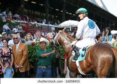 SARATOGA SPRINGS - August 9: Nautical Storm With Jamie Theriot Aboard In The Winners Circle After The Eight Race August 9, 2008 In Saratoga Springs, NY.