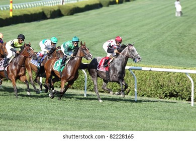 SARATOGA SPRINGS - JULY 30: Unbridled Humor Leads Bay To Bay In The Clubhouse Turn During The Grade 1 Diana Stakes July 30, 2011 In Saratoga Springs, NY.