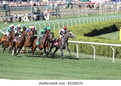 SARATOGA SPRINGS - JULY 30: Unbridled Humor Leads Bay To Bay In The Clubhouse Turn During The Grade 1 Diana Stakes July 30, 2011 In Saratoga Springs, NY.