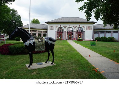 Saratoga Springs, New York, USA - August 6, 2022: The Magic Fiberglass Horse Statue By Jenny McShan On Broadway In Front Of The Saratoga Springs Visitor Center