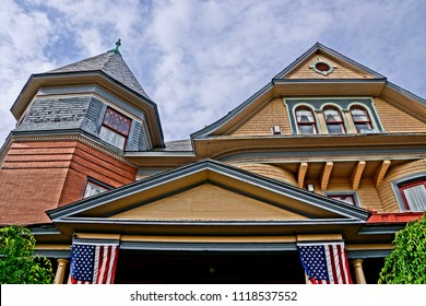 Saratoga Springs, New York/USA- June 22, 2018: A Horizontal High Definition Image Of The Front Facade And Entryway Of A Historic Iconic Queen Anne Victorian Mansion Turned Into A Hotel.       