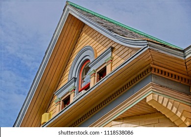 Saratoga Springs, New York/USA- June 22, 2018: A Horizontal High Definition Closeup Image Of The Colorful Ornate Gable End Of A Historic Iconic Queen Anne Victorian Mansion Turned Into A Hotel. 