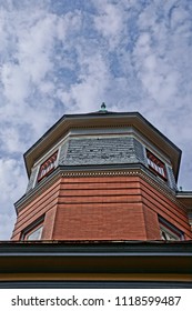 Saratoga Springs, New York/USA- June 22, 2018: A Vertical High Definition Closeup Image Of The Colorful Ornate Tower Of A Historic Iconic Queen Anne Victorian Mansion Turned Into A Hotel. 