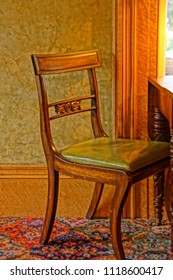 Saratoga Springs, New York/USA- June 22, 2018: A Vertical High Definition  Image Of A Table And Chair In The Parlor Of A Historic Iconic Queen Anne Victorian Mansion Turned Into A Hotel.