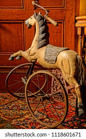 Saratoga Springs, New York/USA- June 22, 2018: A Vertical High Definition  Image Of An Antique Rocking Horse In A Historic Iconic Queen Anne Victorian Mansion Turned Into A Hotel.                   