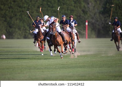 SARATOGA SPRINGS, NY - AUGUST 24: Unknown players in polo during the Ylvisaker Memorial Tournament at Saratoga Polo on August 24, 2012 at Saratoga Springs, New York