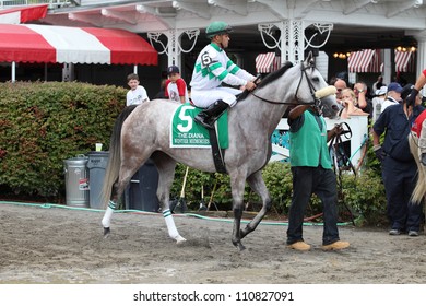 SARATOGA SPRINGS, NY - JULY 28: Jockey Javier Castellano Aboard Winter Memories Leaves The Paddock For The Post Parade Of The Diana Stakes On July 28, 2012 Saratoga Springs, New York