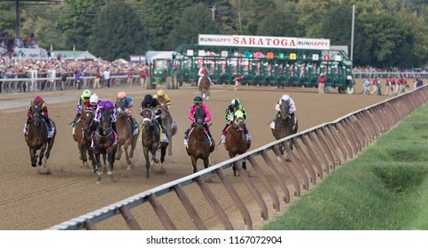 Saratoga Springs, NY, USA - August 25, 2018: The field the first time around in the 1.25 Million $ Travers Stakes on Travers day August 25, 2018 Saratoga Springs, NY, USA 