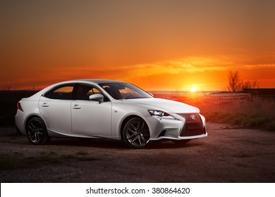 Saratov, Russia - May 08, 2014: White Modern Car Lexus IS250 Stay On Road At Beautiful Sunset