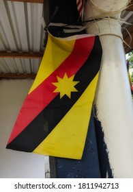 The Sarawak Flag Hangs On A Pole