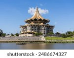 Sarawak Legislative Assembly (New Building) or "Dewan Undangan Sarawak" from opposite bank of Sarawak River, Kuching, Sarawak, Malaysian Borneo.