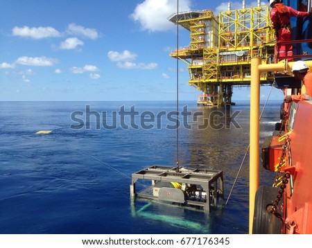 SARAWAK, MALAYSIA - JUNE 16th, 2017: Unidentified offshore crews was monitored ROV during recovering ROV to DMS.