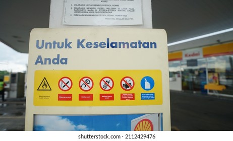 Sarawak, Malaysia – June 30 2013: The Image Showing A Gas Station Or Petrol Station Safety Signs Which Indicate That No Smoking, Prohibited Using Phone, Stop Engine.