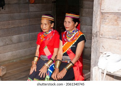 Sarawak, Malaysia – October 21, 2021: The Photo Showing Native Women Or 'ring Ladies' Of Sarawak. This Indigenous Ladies Wearing The Yellow Copper Rings Since They Were Young.