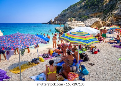 Sardinia/Italy - August 26, 2019 - Crowd Of Tourists On Cala Mariolu Beach In The Golf Of Orosei