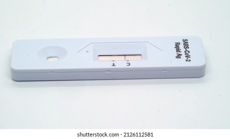 SARS-Cov-2 Rapid Ag Antigen Coronavirus Rapid Self Test. Covid-19 Virus Testing At Pandemic, Medical Equipment For Healthcare. Covid Pcr Negative Or Positive Result At White Isolated Background