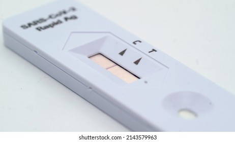 SARS-Cov-2 Rapid Ag Antigen Coronavirus Rapid Self Test. Covid-19 Virus Testing At Pandemic, Medical Equipment For Healthcare. Covid Pcr Negative Or Positive Result At White Isolated Background