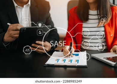 SASE Secure Access Service Edge concept Hand touching Secure Access Service Edge icon on virtual screen background, password, network, framework and support technology in modern office
 - Powered by Shutterstock