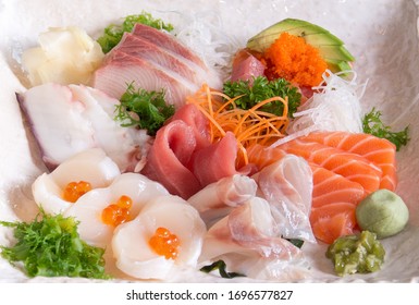 Sashimi. Sashimi (刺身, English: /səˈʃiːmi/ sə-SHEE-mee) is a Japanese delicacy consisting of fresh raw fish or meat sliced into thin pieces and often eaten with soy sauce. 