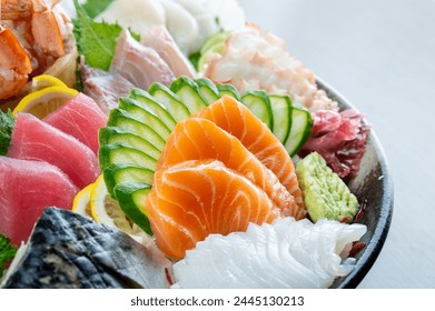 sashimi mixed fresh set japanese food variation in dish. Sashimi Japanese food, Sashimi set with wasabi, fish, shrimp in plate of Assorted. fresh slide mix fish set on ice menu in restaurant - Powered by Shutterstock