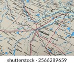 Saskatoon, Canada, a map from an atlas, suitable to illustrate travel destinations, tourism topics and world economy, trade and politics backgrounds