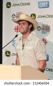 SASKATOON, CANADA - SEPT 9:  Dean Brody, winner of best male artist and album of the year at the 2012 Canadian Country Music Association Awards at Credit Union Centre on Sept 9,2012 in Saskatoon,Canada