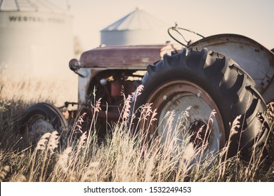 Saskatoon, SK/Canada - October 13, 2019: Old Tractor On A Farm. 