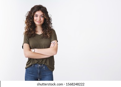 Sassy attractive confident freelance armenian girl with curly hair standing self-assured arms crossed chest grinning determined accomplish any goal, ready solve your problem, white background