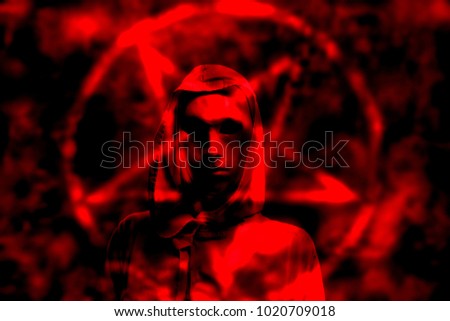 satanic priest in red background 