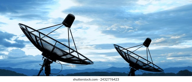 the satellite dish antennas and the blue sky