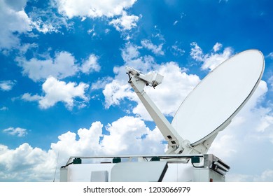 Satellite Dish On Tv News Truck With Beautiful Blue Sky
