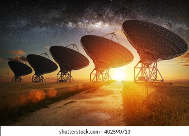 Satellite dish view at night with milky way in the sky - Shutterstock ID 402590713