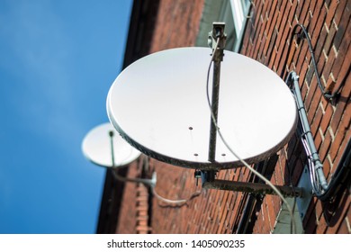 satellite tv antenna on a residential building