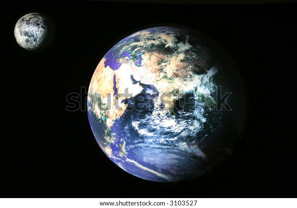 Satellite view of Earth and Moon, photo of the\
accurate model