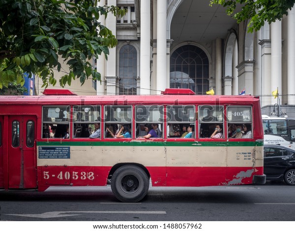 Sathorn, Bangkok, Thailand,
Southeast Asia - Aug 21 2019: Citizens in a fare free public bus on
way to work in morning. Rush hour in downtown. Krung Thep Maha
Nakorn.