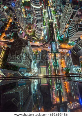 Similar – Skyline of Manhattan at night with skyscrapers lights