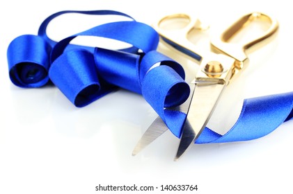 Satin ribbon curled around scissors isolated on white - Powered by Shutterstock