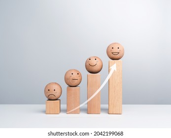 Satisfaction And Business Growth Process And Economic Improvement Concept. Emoticon, Emotion Faces Wooden Balls And Wood Cube Blocks Chart Steps On White Background With Copy Space, Minimal Style.