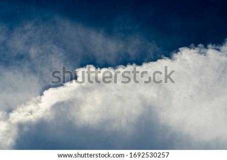 the satisfactory composition of the sky with clouds