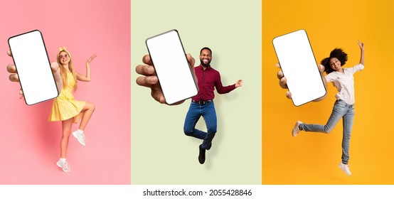 Satisfied active caucasian and african american women and man jumping and showing phone with blank screen, isolated on colorful background. Digital advertising, great offer, promo and blog, collage