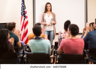 Satisfied Assistant Finished Teaching And Her Students Clapping Hands